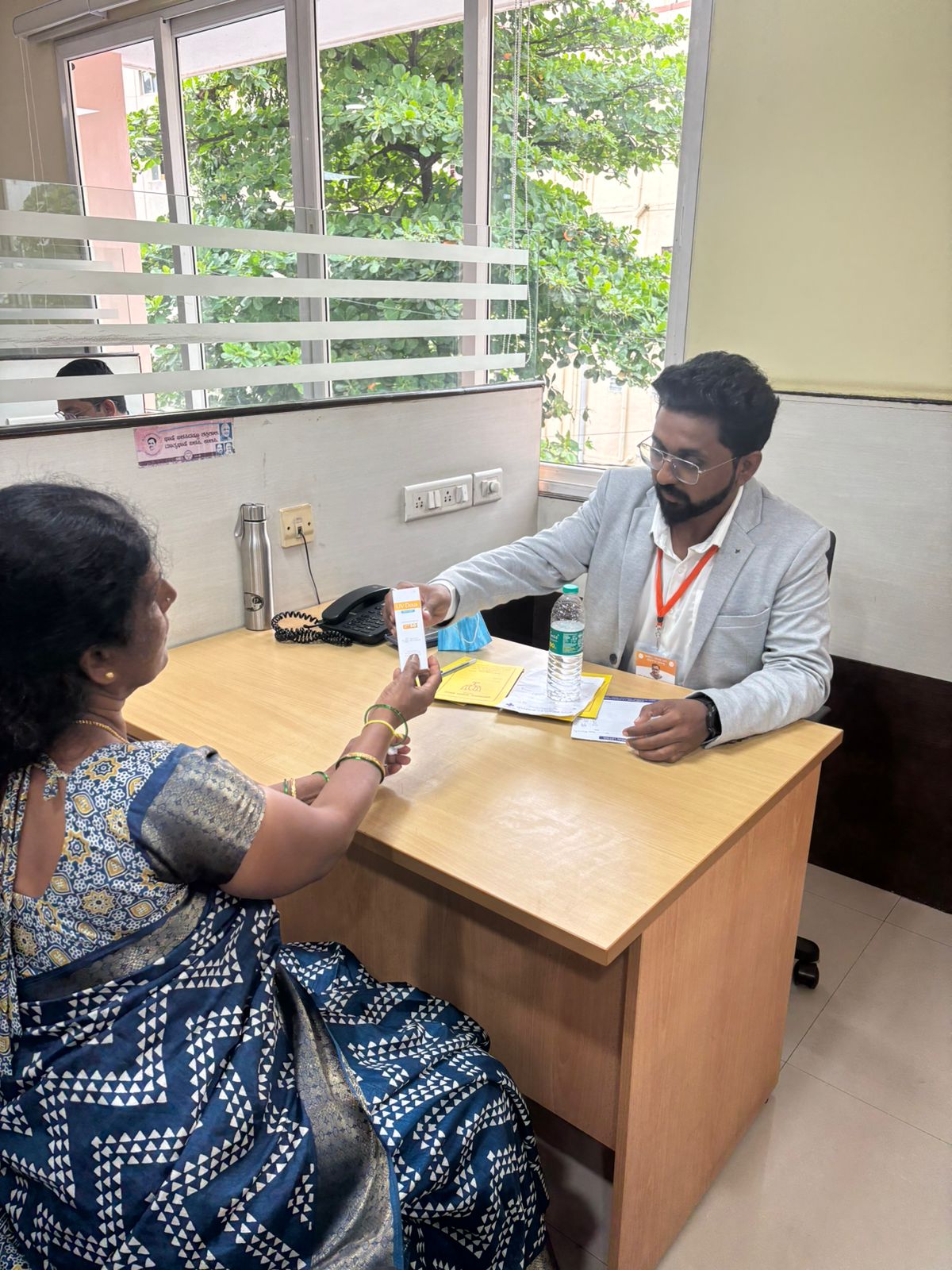 Dr. Vilas B during a skin care consultation at Jeevika Health Care, Ramamurthy Nagar
